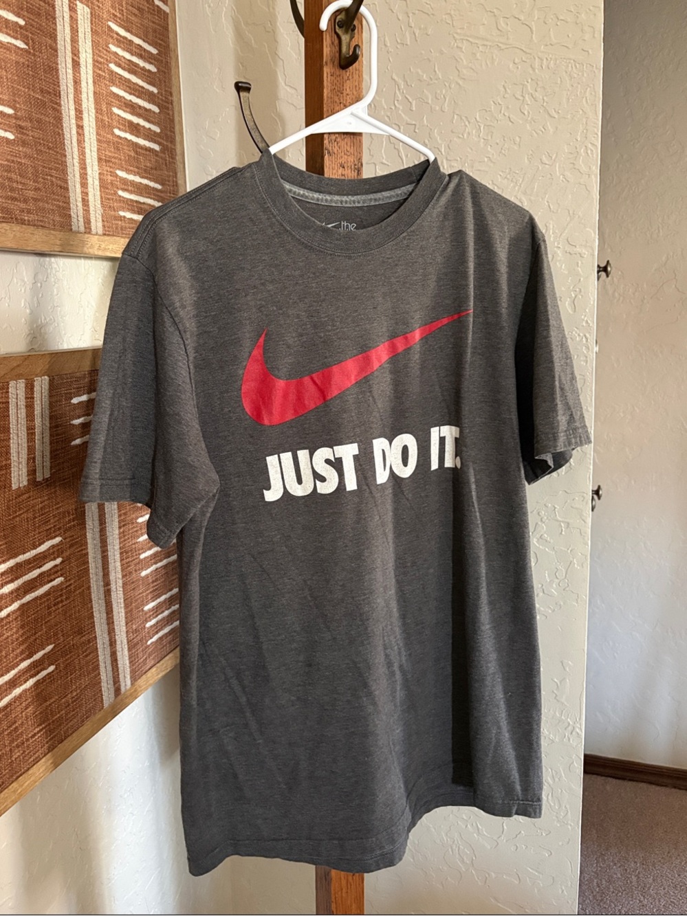 Nike Dark Gray Tee with Red Swoosh and White Text
